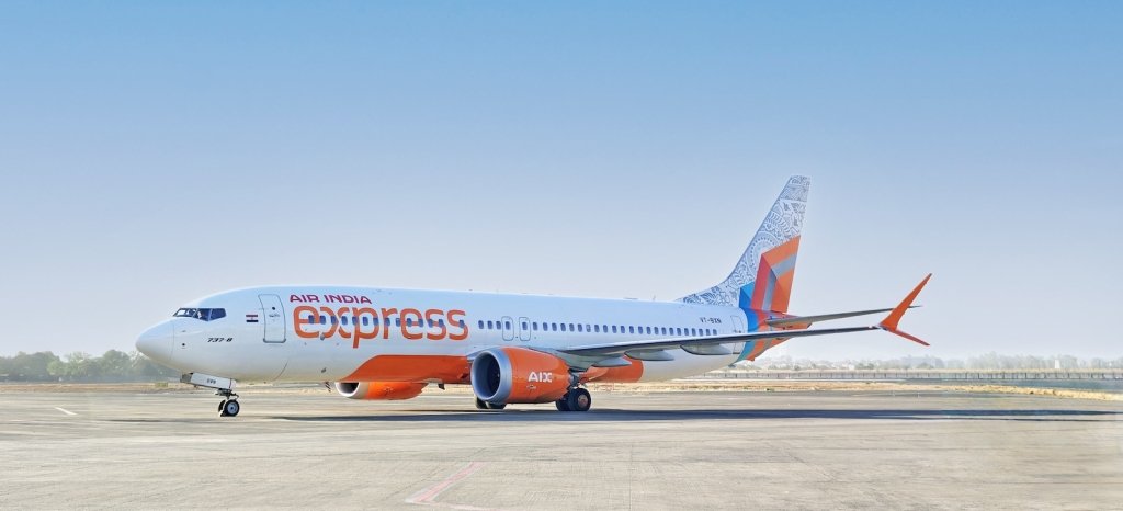 Air India Express aircraft featuring Uttarakhand Aipan motifs from Tales of India, celebrating sacred symbols and mountain traditions.